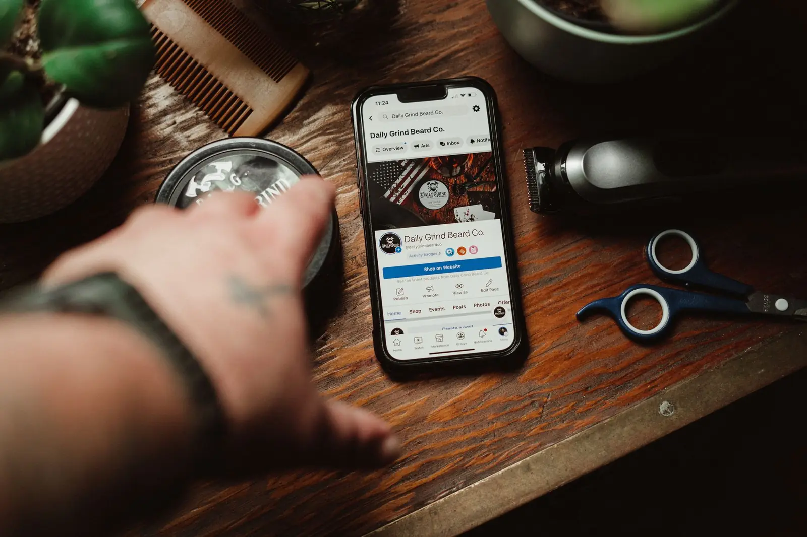 Scrolling a business social media feed on a phone